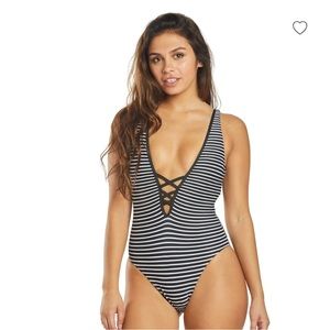 women’s black and white striped swimsuit